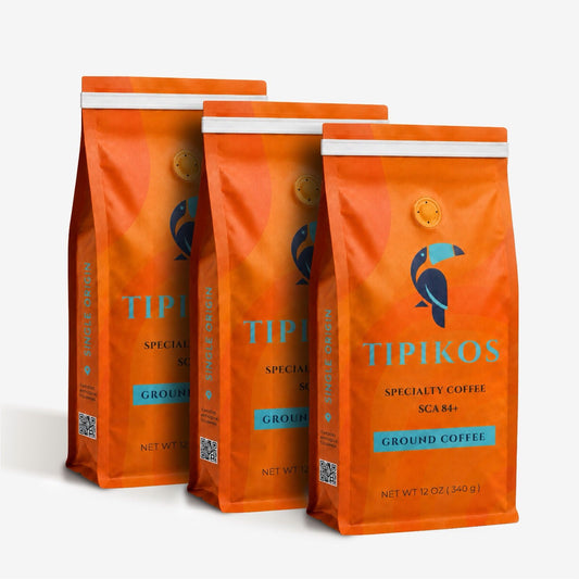 Front view of TIPIKOS Colombian Medium Roast Ground Coffee 3-Pack with three 12 oz 100% Arabica bags